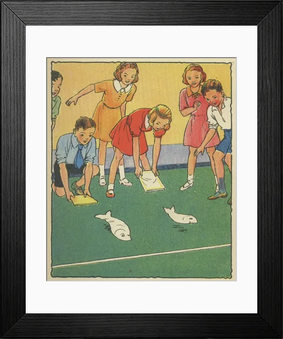 Framed Print : Children playing a game of Flap the Kipper. Cut two fish shapes out of thin paper and lay them parallel Framed Print : Children playing a game of Flap the Kipper. Cut two fish shapes out of thin paper and lay them parallel