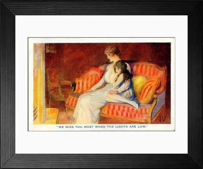 Framed Print : Postcard, Mother and daughter at home - We miss you most when the lights are low. Date: 1914-1918 Framed Print : Postcard, Mother and daughter at home - We miss you most when the lights are low. Date: 1914-1918
