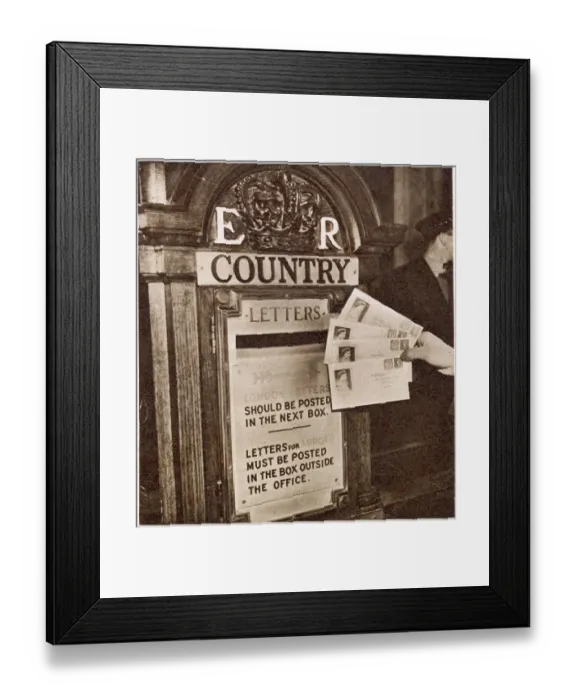 Framed Print : Some of the first letters to bear the stamps of the new reign of Queen Elizabeth II being posted at the General Post Office in London, just after midnight on December 5 1952, in special envelopes. Date: 1952
