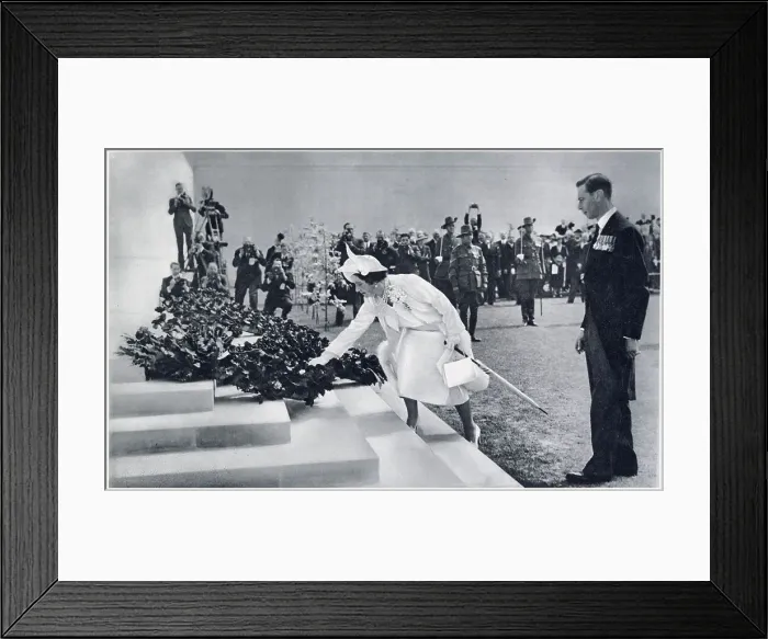 Framed Print : Queen Elizabeth spontaneously placing a single poppy upon the wreath previously laid by the King at the Australian War Memorial during their state visit to France in 1938. Date: 1938 Framed Print : Queen Elizabeth spontaneously placing a single poppy upon the wreath previously laid by the King at the Australian War Memorial during their state visit to France in 1938. Date: 1938