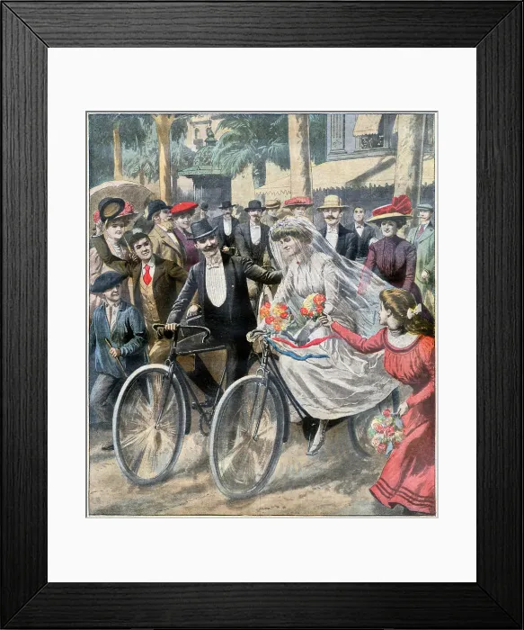 Framed Print : A couple of keen cyclists pedal away from the church on their machines... Date: 1909 Framed Print : A couple of keen cyclists pedal away from the church on their machines... Date: 1909