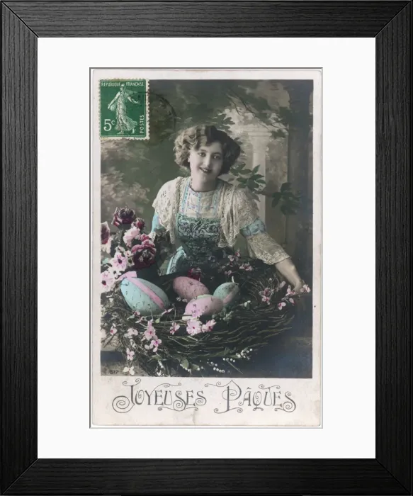 Framed Print : Young woman with a basket of decorated Easter eggs Framed Print : Young woman with a basket of decorated Easter eggs