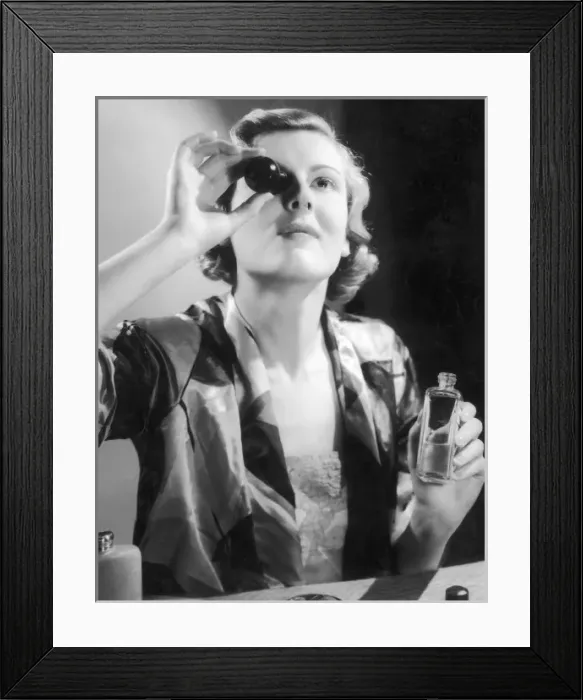 Framed Print : Lady Using Eyebath / Photo Framed Print : Lady Using Eyebath / Photo