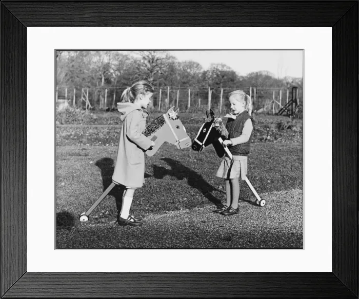 Framed Print : Twins on Hobby Horses Framed Print : Twins on Hobby Horses