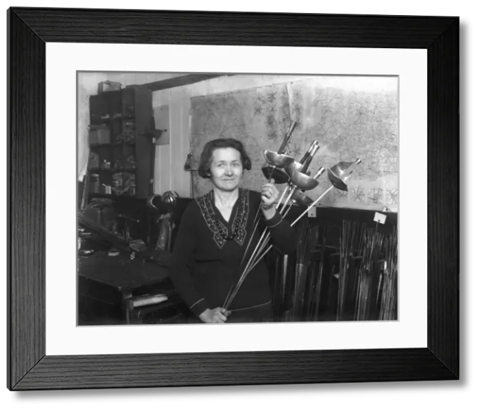 Framed Print : Woman Sword Maker Framed Print : Woman Sword Maker