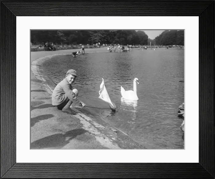 Framed Print : Boy Sailing a Boat