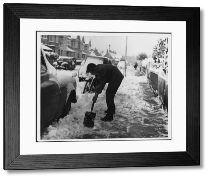 Framed Print : Man Clears Snow Framed Print : Man Clears Snow