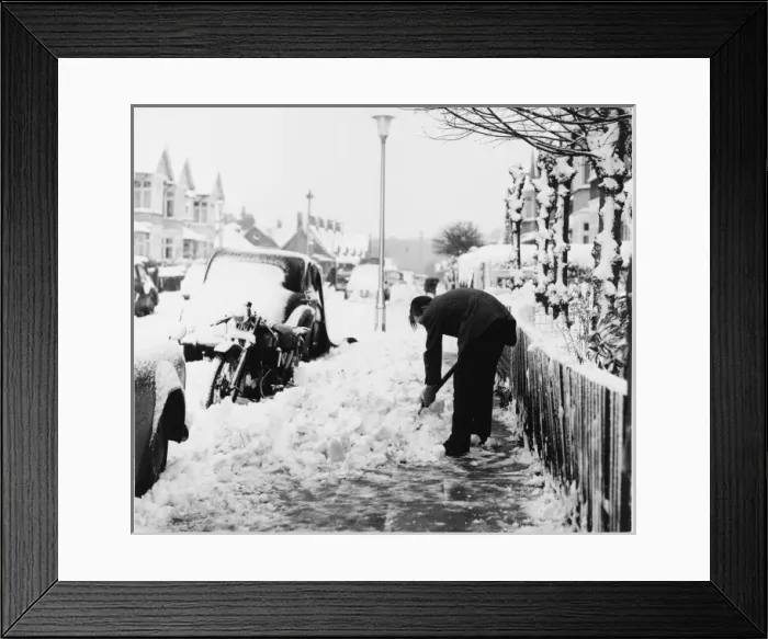 Framed Print : Man Shovels Snow Framed Print : Man Shovels Snow