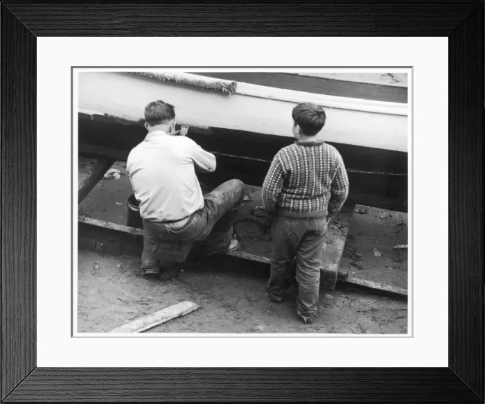 Framed Print : Painting a Boat Framed Print : Painting a Boat