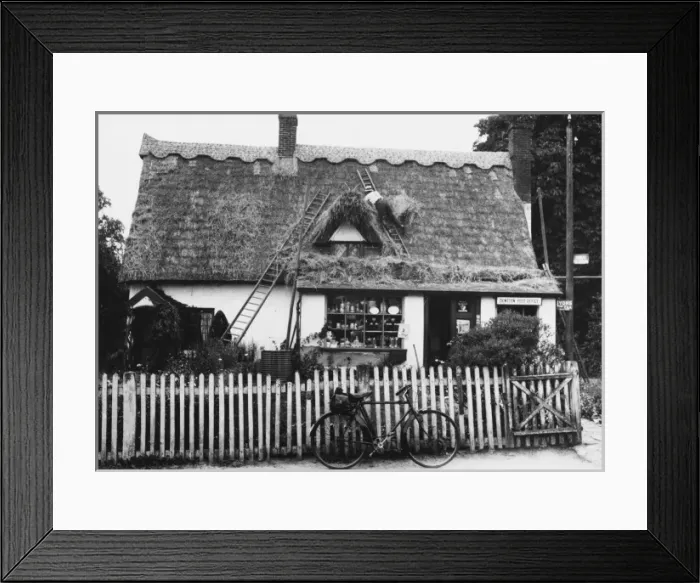 Framed Print : Thatching a Post Office Framed Print : Thatching a Post Office