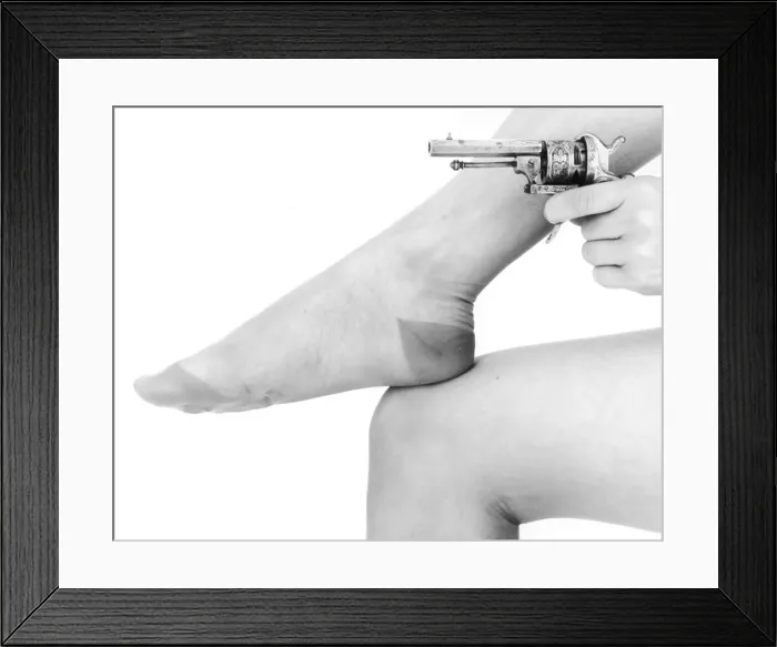Framed Print : A Gun and a Foot Framed Print : A Gun and a Foot