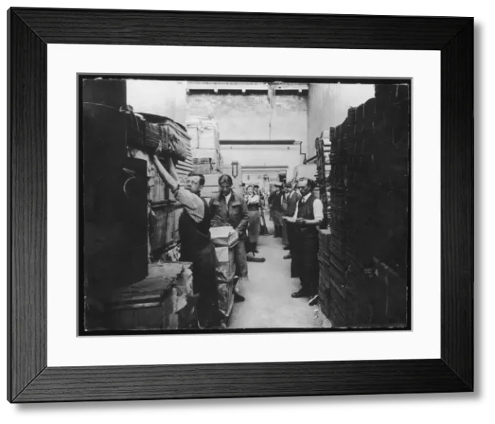 Framed Print : Unloading Paper Framed Print : Unloading Paper