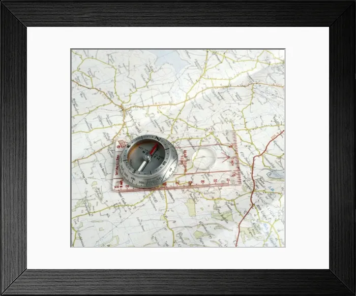 Framed Print : Compass on a Map Framed Print : Compass on a Map