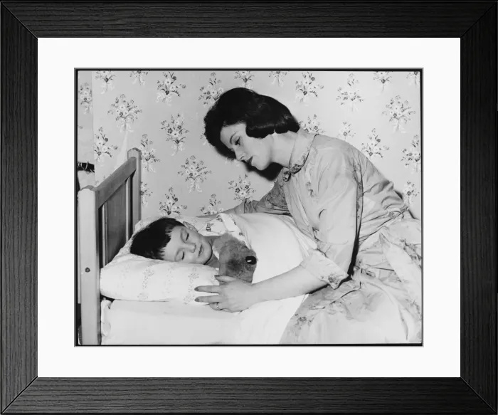 Framed Print : Mother Tucks Son In Framed Print : Mother Tucks Son In