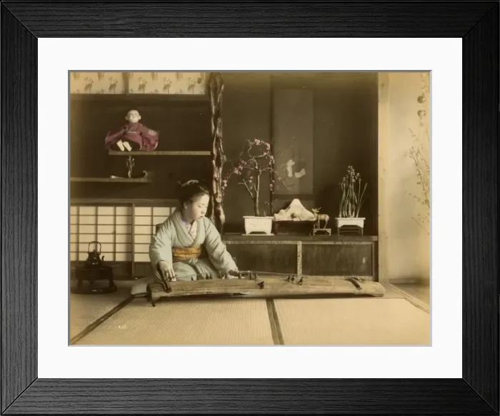 Framed Print : Girl playing musical instrument Framed Print : Girl playing musical instrument