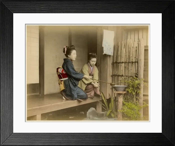 Framed Print : Girls on balcony - washing hands Framed Print : Girls on balcony - washing hands