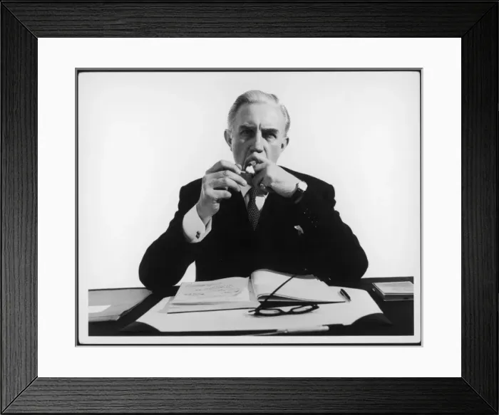 Framed Print : Businessman Lights Cigar Framed Print : Businessman Lights Cigar