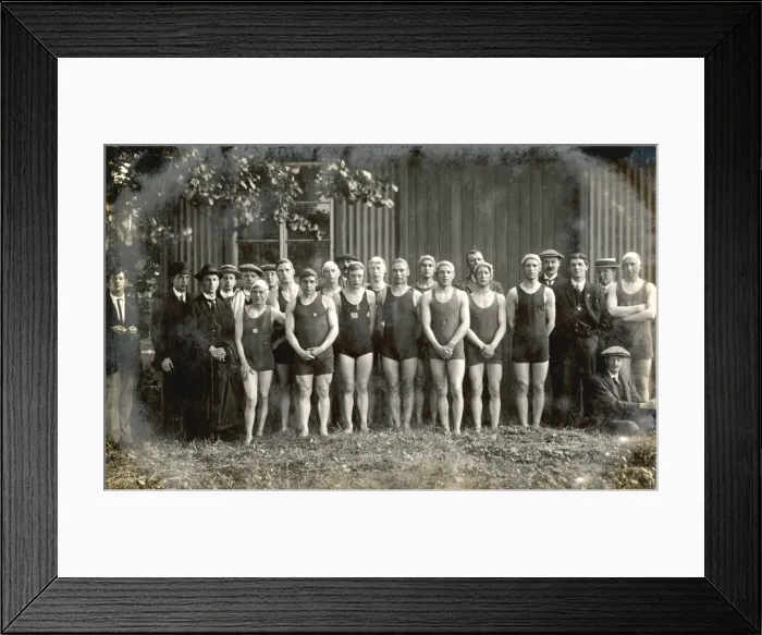 Framed Print : Line-up of twelve swimmers and twelve men in suits Framed Print : Line-up of twelve swimmers and twelve men in suits