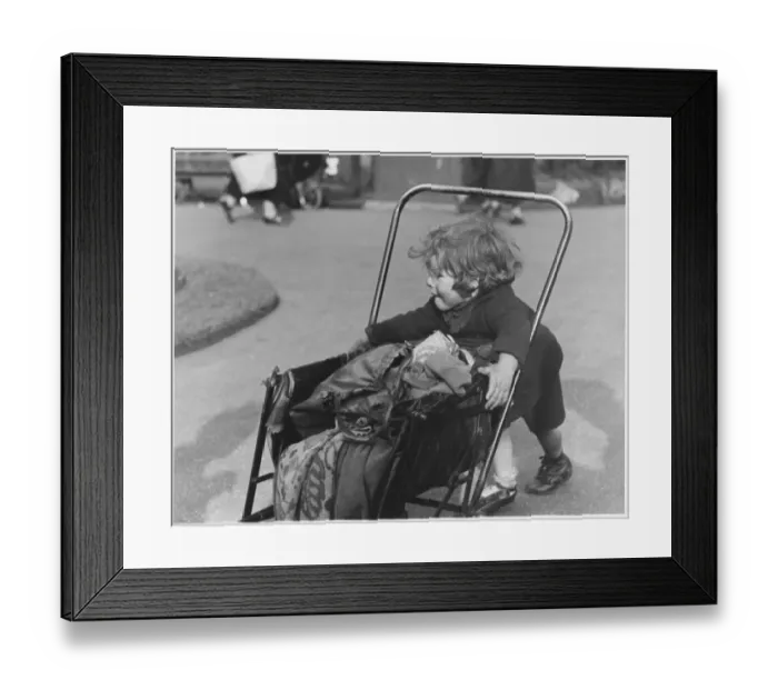 Framed Print : Girl with Pushchair Framed Print : Girl with Pushchair