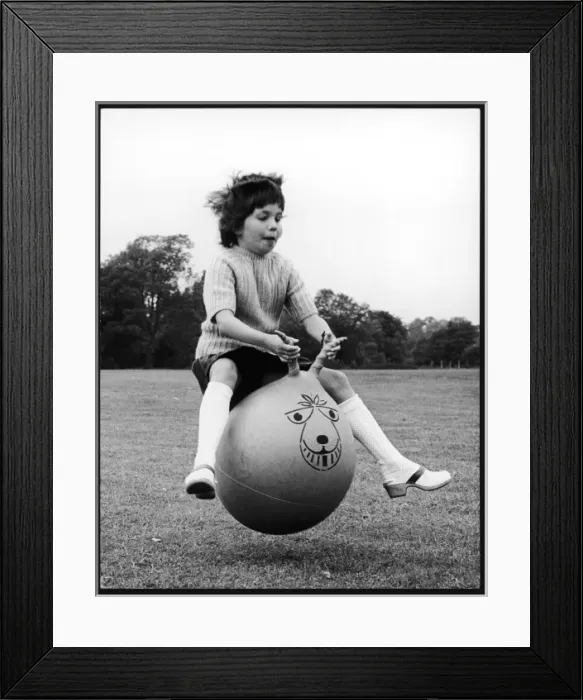 Framed Print : Girl on a spacehopper 1of 4 Framed Print : Girl on a spacehopper 1of 4