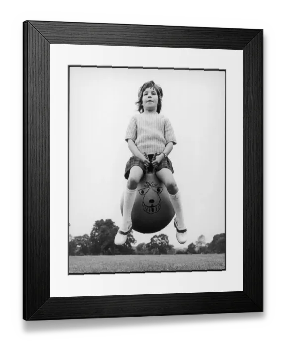 Framed Print : Girl on a spacehopper 2 of 4 Framed Print : Girl on a spacehopper 2 of 4