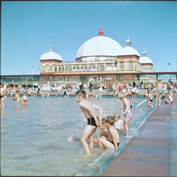 RHYL LIDO. Children enjoying themselves in the lido next to the pier at Rhyl