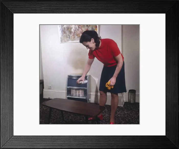 Framed Print : Dusting a Coffee Table Framed Print : Dusting a Coffee Table