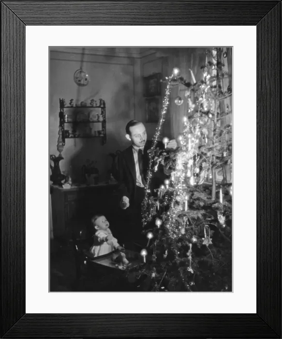 Framed Print : Lighting Candles on Tree Framed Print : Lighting Candles on Tree