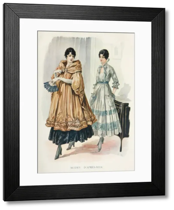 Framed Print : Modes d. Two models dressed in elegant afternoon gowns, one with a sumptuous cloak or coat Framed Print : Modes d. Two models dressed in elegant afternoon gowns, one with a sumptuous cloak or coat