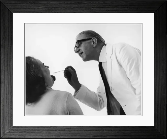 Framed Print : Doctor Examines Patient Framed Print : Doctor Examines Patient