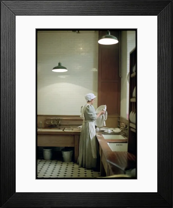 Framed Print : Kitchenmaid in Kitchen Framed Print : Kitchenmaid in Kitchen