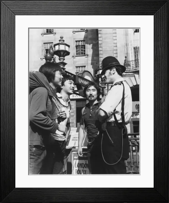 Framed Print : Policeman and Tourists Framed Print : Policeman and Tourists