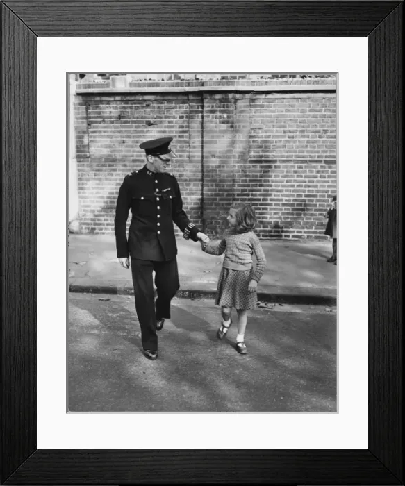 Framed Print : Police Officer and Child Framed Print : Police Officer and Child