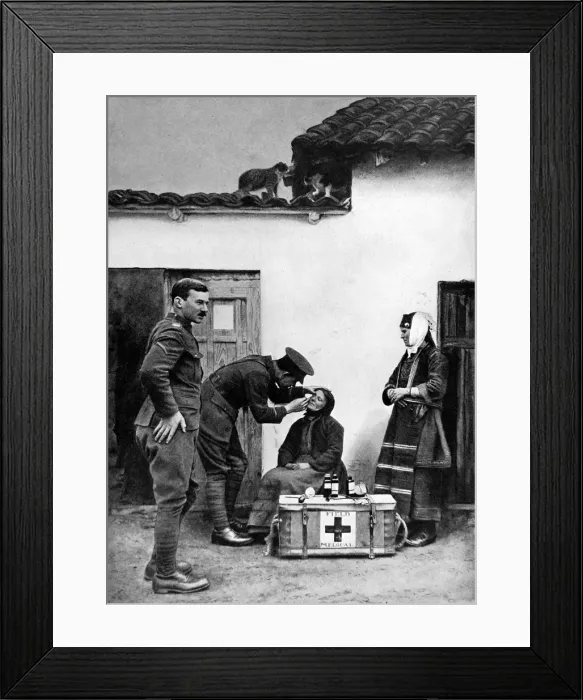 Framed Print : A British doctor attending to a Macedonian villager Framed Print : A British doctor attending to a Macedonian villager