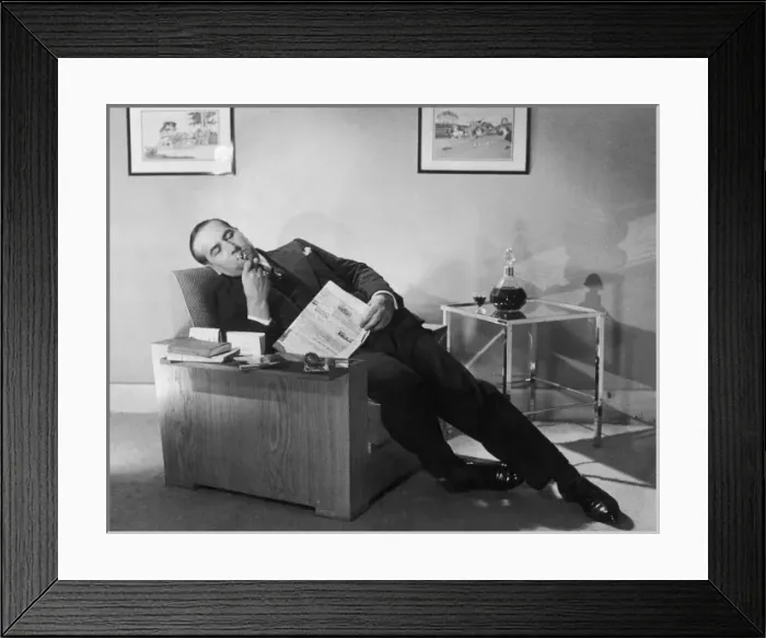 Framed Print : Man Relaxing with Pipe