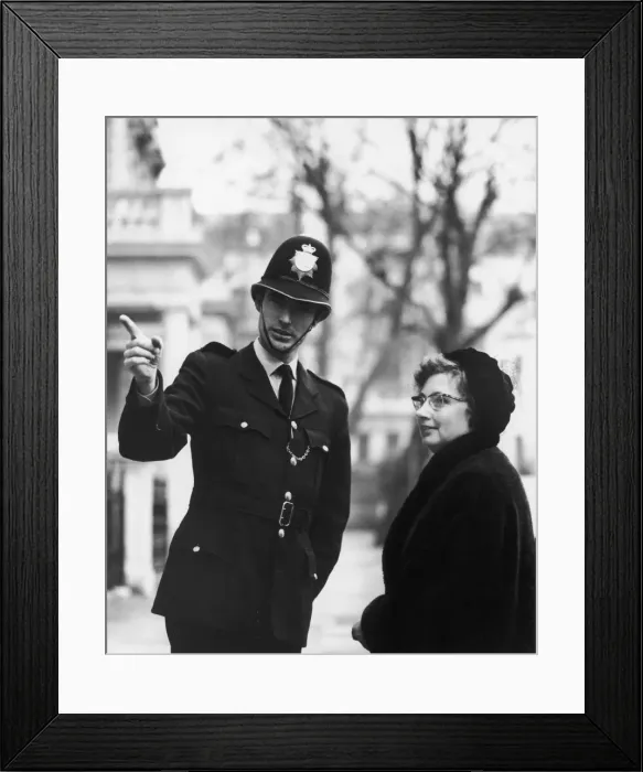 Framed Print : Policeman Directs Lady Framed Print : Policeman Directs Lady