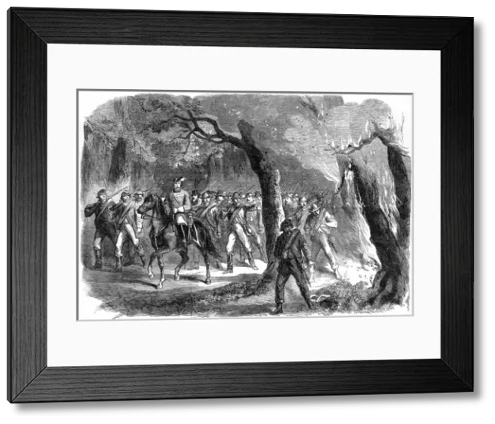 Framed Print : Confederate Troops moving through a burning forest; American Framed Print : Confederate Troops moving through a burning forest; American
