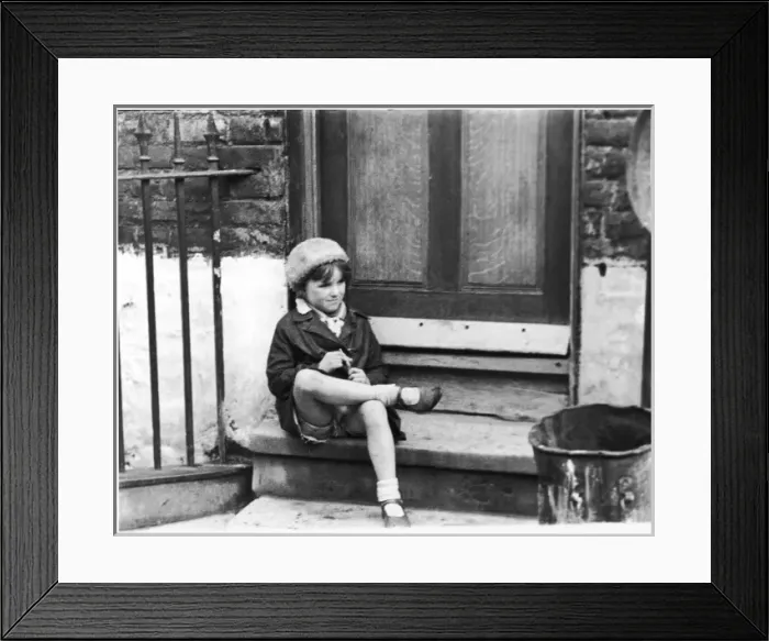 Framed Print : Girl / Raincoat / Doorstep Framed Print : Girl / Raincoat / Doorstep