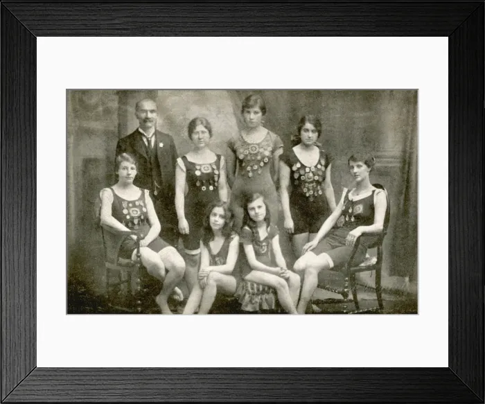 Framed Print : Seven female swimmers, five of them with medals Framed Print : Seven female swimmers, five of them with medals