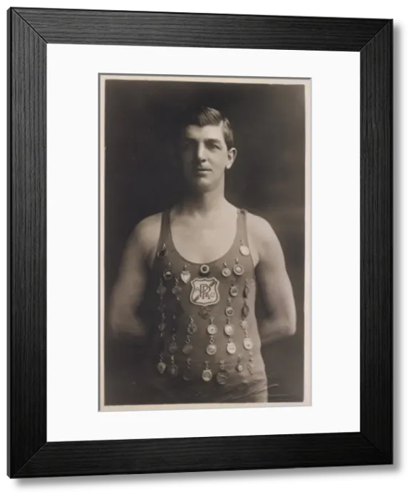 Framed Print : Swimming champion with medals on his costume Framed Print : Swimming champion with medals on his costume