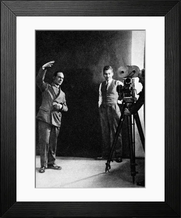 Framed Print : Miming a gesture, the method of registering sunshine, posed Framed Print : Miming a gesture, the method of registering sunshine, posed