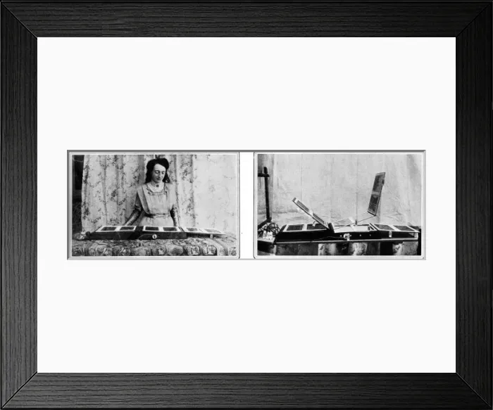 Framed Print : Colour transparencies being viewed on a lightbox book Framed Print : Colour transparencies being viewed on a lightbox book