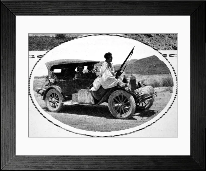 Framed Print : An Afghan guard passing through the desert during the Afghan Framed Print : An Afghan guard passing through the desert during the Afghan