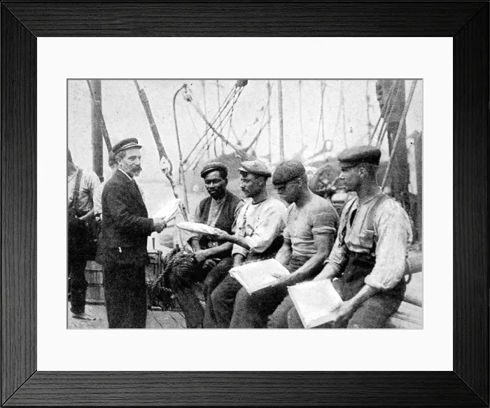 Framed Print : Mission to Seamen Chaplain distributing Papers, 1906