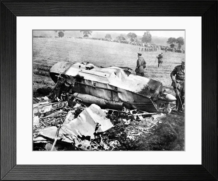 Framed Print : A gondola, part of a crashed zeppelin, being examined by Framed Print : A gondola, part of a crashed zeppelin, being examined by