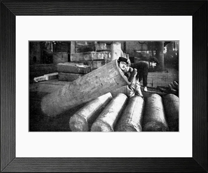 Framed Print : A French soldier lying inside an artillery shell case Framed Print : A French soldier lying inside an artillery shell case
