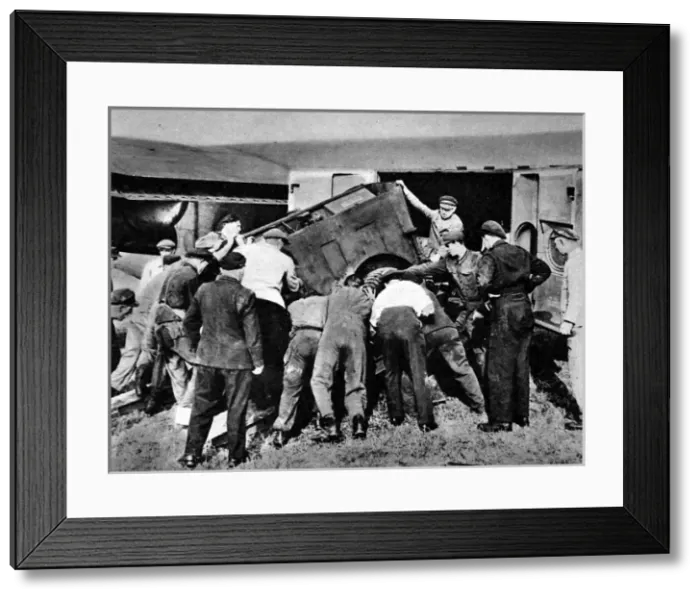 Framed Print : Unloading an airplane, Gatow Airport, Berlin, 1948 Framed Print : Unloading an airplane, Gatow Airport, Berlin, 1948