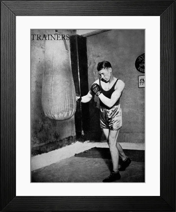 Framed Print : Dave McCleave using a punch bag, 1936 Framed Print : Dave McCleave using a punch bag, 1936