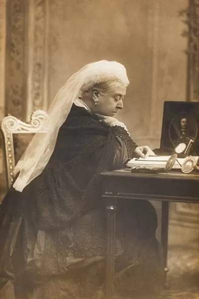Queen Victoria at her desk