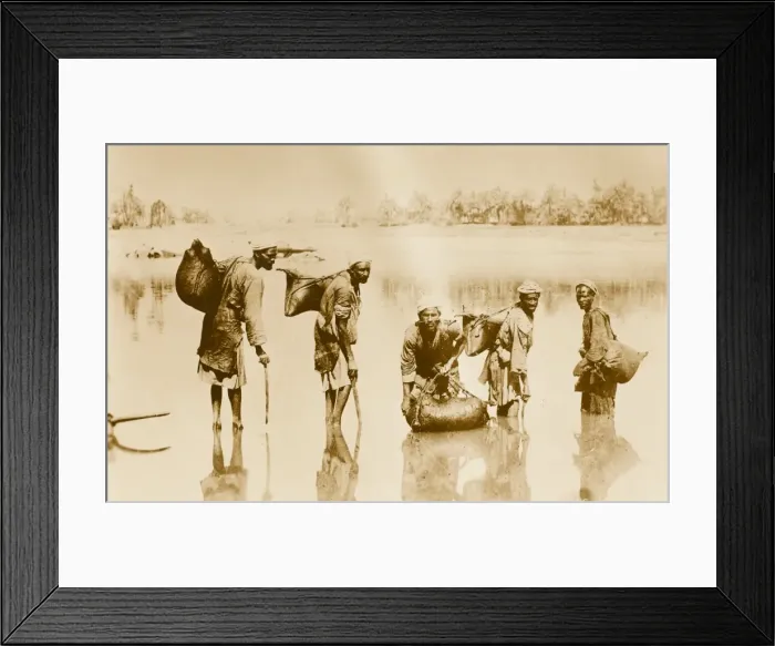 Framed Print : Egypt - River Nile - Water carriers fill their water skins Framed Print : Egypt - River Nile - Water carriers fill their water skins